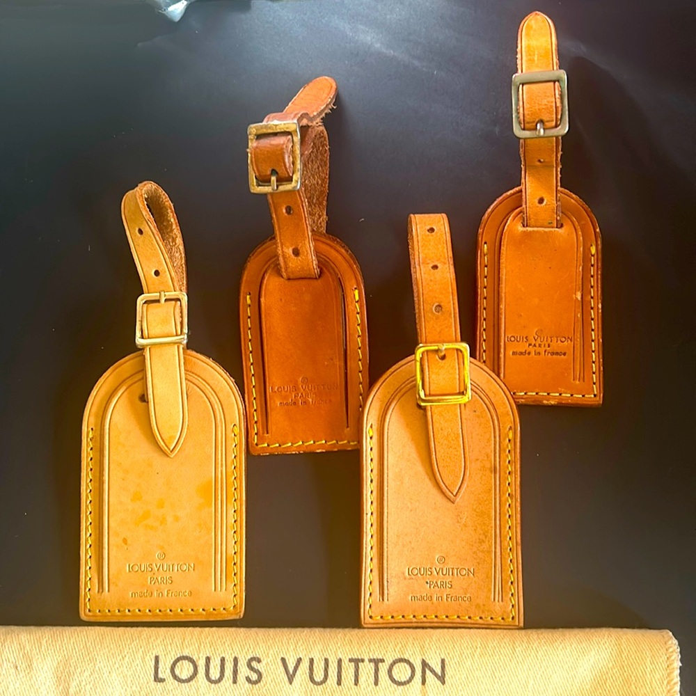 Louis Vuitton luggage tags. Pre-loved condition.